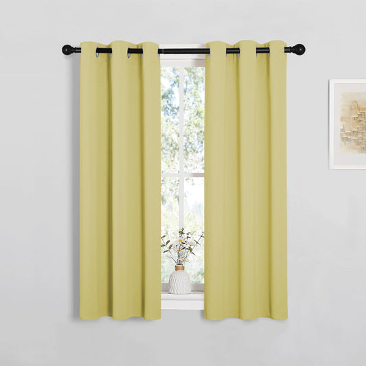 NICETOWN Blackout Window Curtain Panels - Thermal Insulated Grommet Drapes | Paler Yellow, 29x45 Inch (1 Pair)
