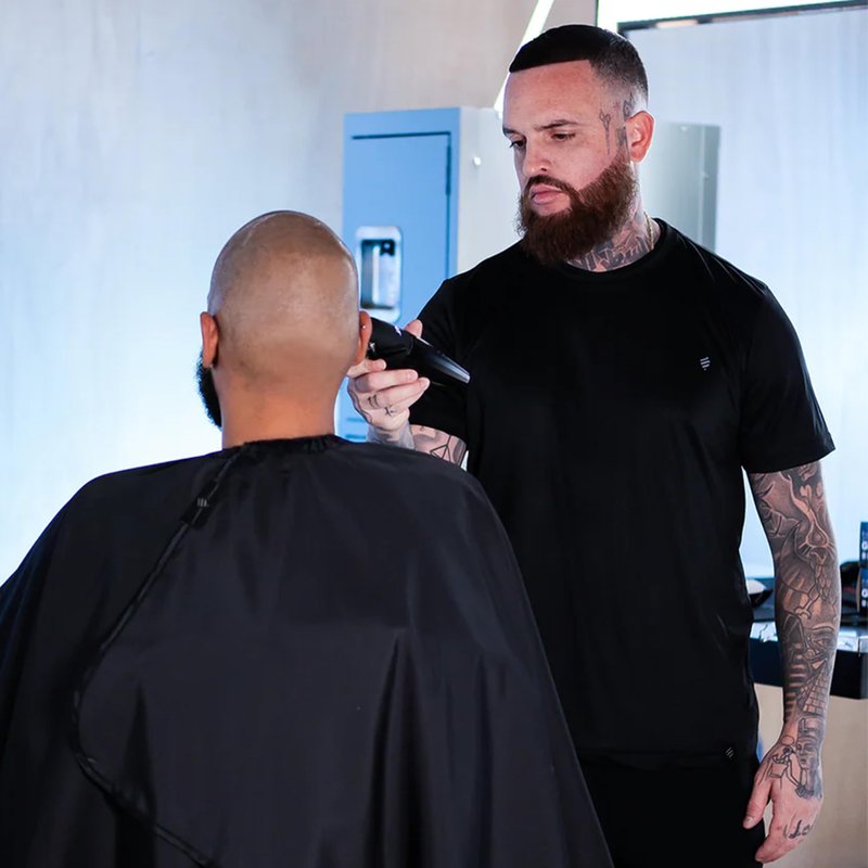 Barber Strong The Junior Hands-Free Barber Cape for Kids, Hair Repelling and Static-Reducing Material, Flexible Elastic Neckband, Water Resistant Fabric, Oversized for Complete Coverage - Black