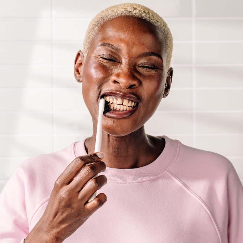 Boka Classic Manual Toothbrush with Extra Soft Activated-Charcoal, Tapered Bristles, Bioplastic Handle that Includes Travel Cap, Dentist-Approved, Great for Adults and Kids, Pink (Pack of 1)